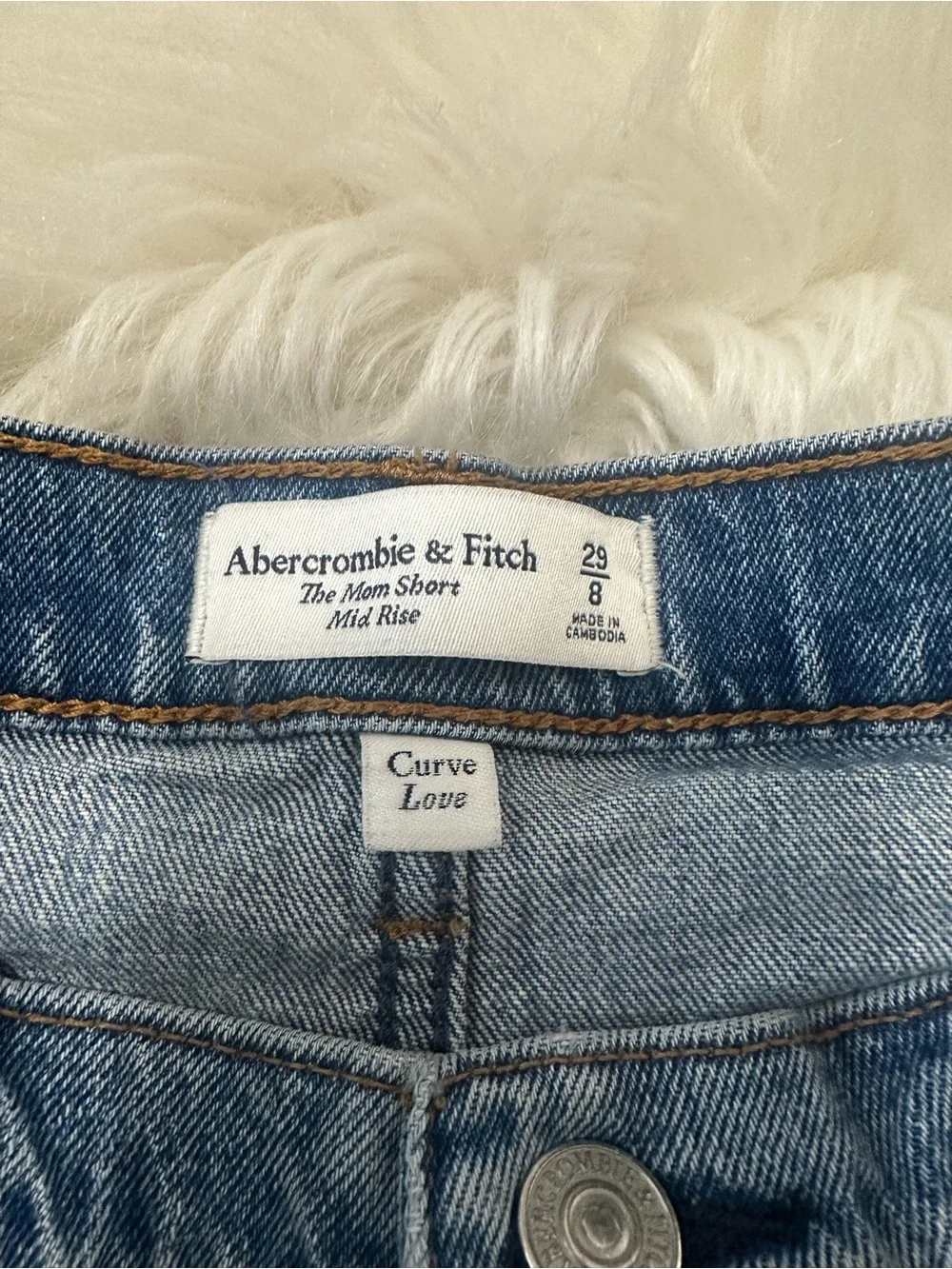 Abercrombie & Fitch Distressed Light Blue Denim Shorts has stretch